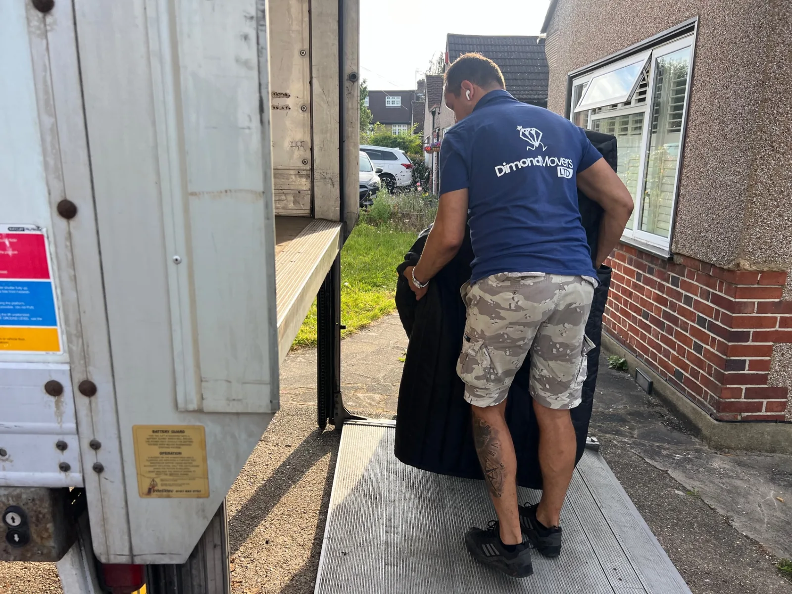 Furniture being loaded into a removals van